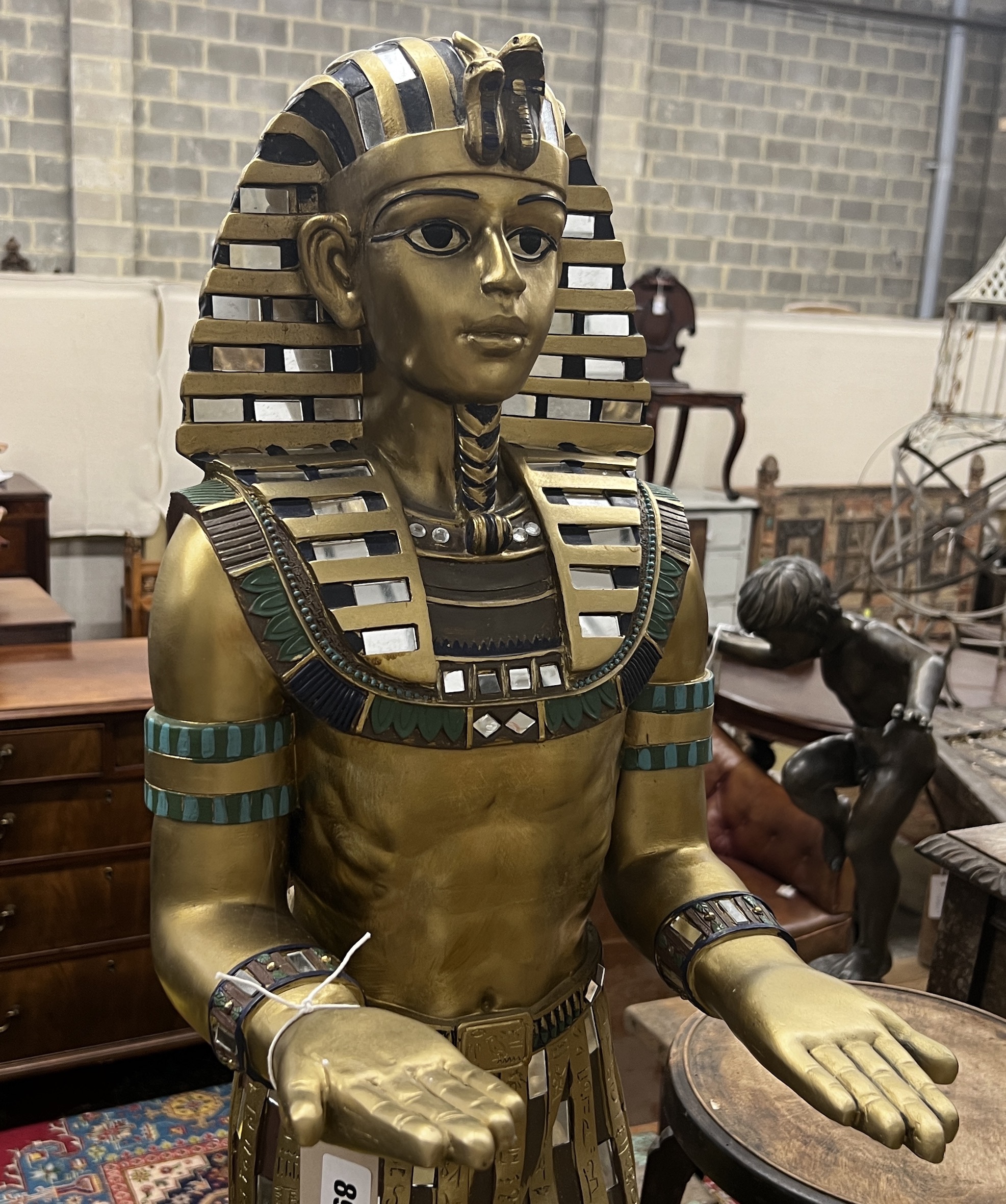 A composition Egyptian style waiter, lacking tray, height 114cm